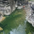 The brilliant green pool below Tevelein Falls